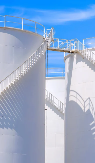 low-angle-view-of-spiral-staircase-on-white-fuel-t-2025-03-11-12-09-36-utc-min