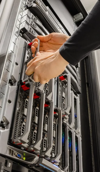 male-it-consultant-removing-blade-server-from-rack-2025-03-11-03-34-06-utc-min