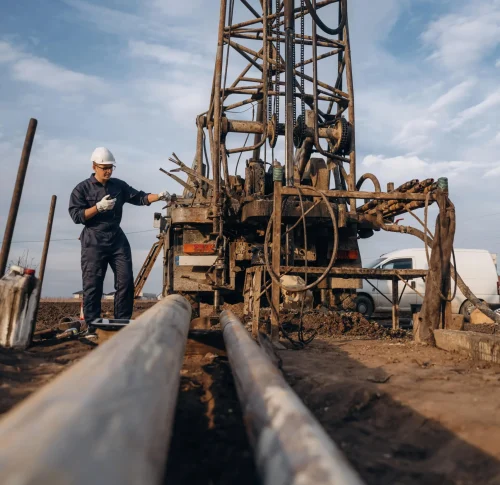 walkie-talkie-in-hand-construction-worker-is-near-2025-05-05-01-40-50-utc-min